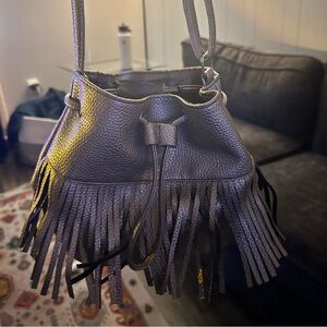 Copper cross body bag from fringe at the bottom